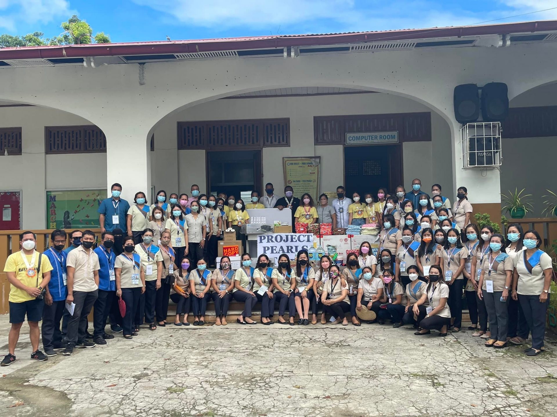 Children and volunteers during Bayanihan in Bohol