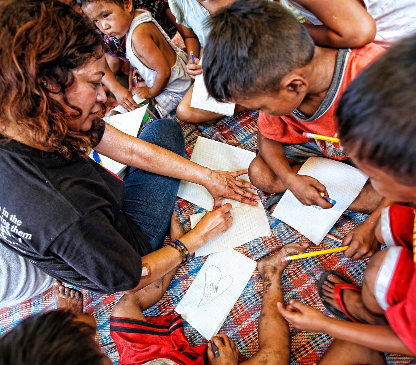 Project PEARLS educator supporting children as they learn together