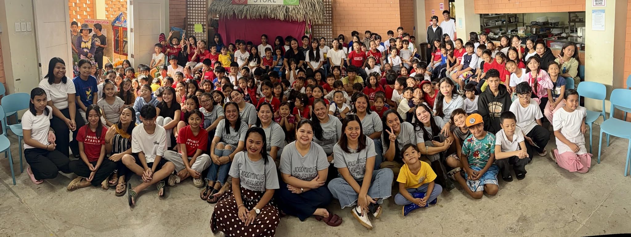 Project PEARLS children, families and volunteers gathered together