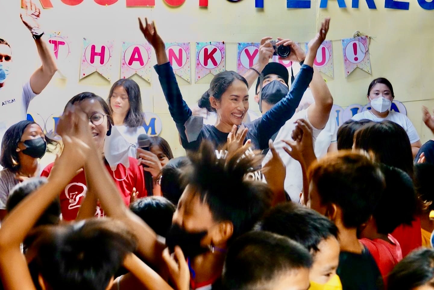 Project PEARLS volunteers and children together