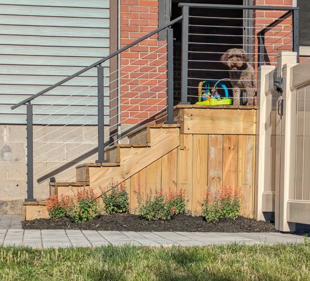 Wood stair and railing detail at The Modern Terraced Gardens and Patio