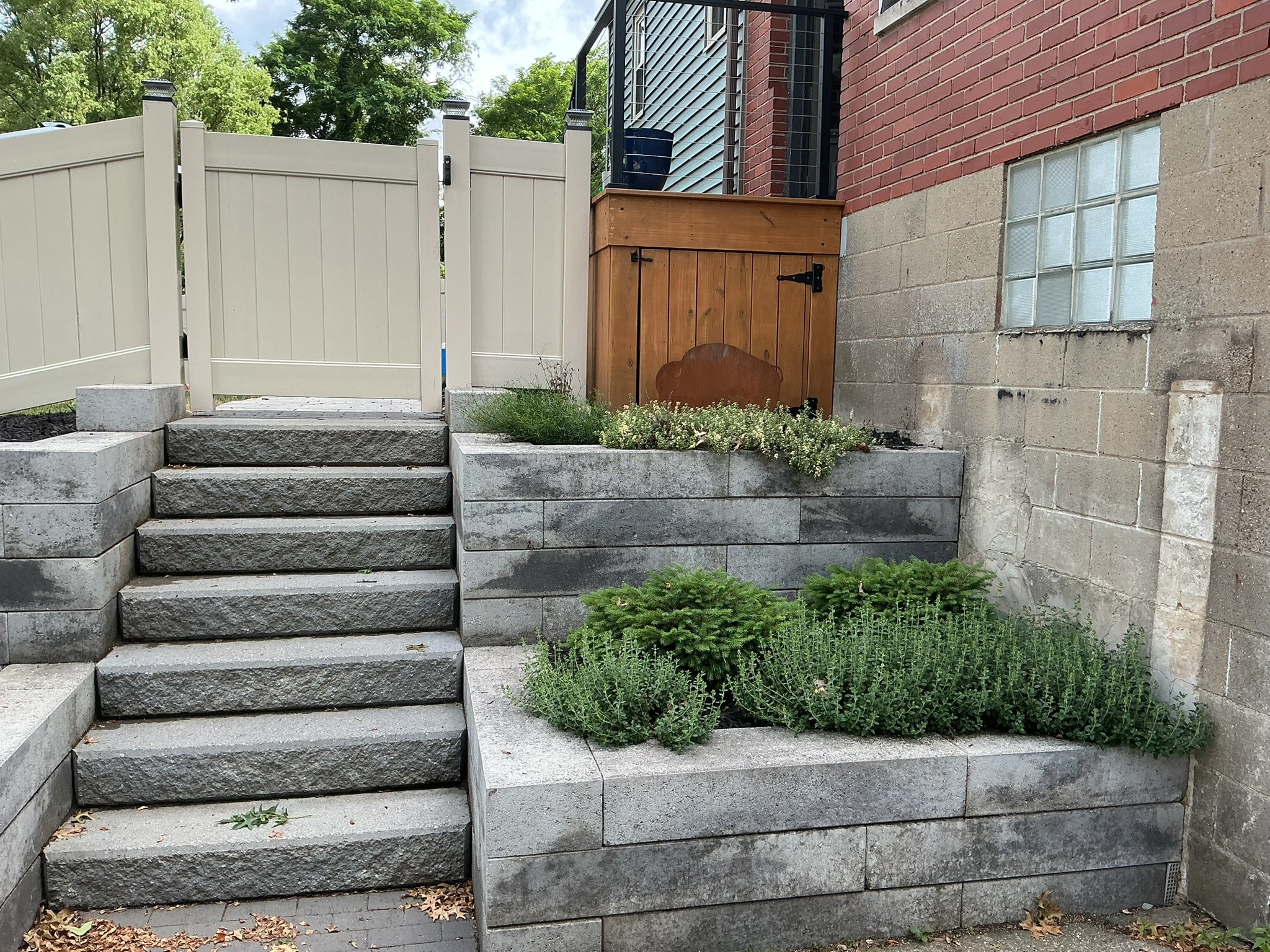 Stone steps and terraced garden at The Modern Terraced Gardens and Patio