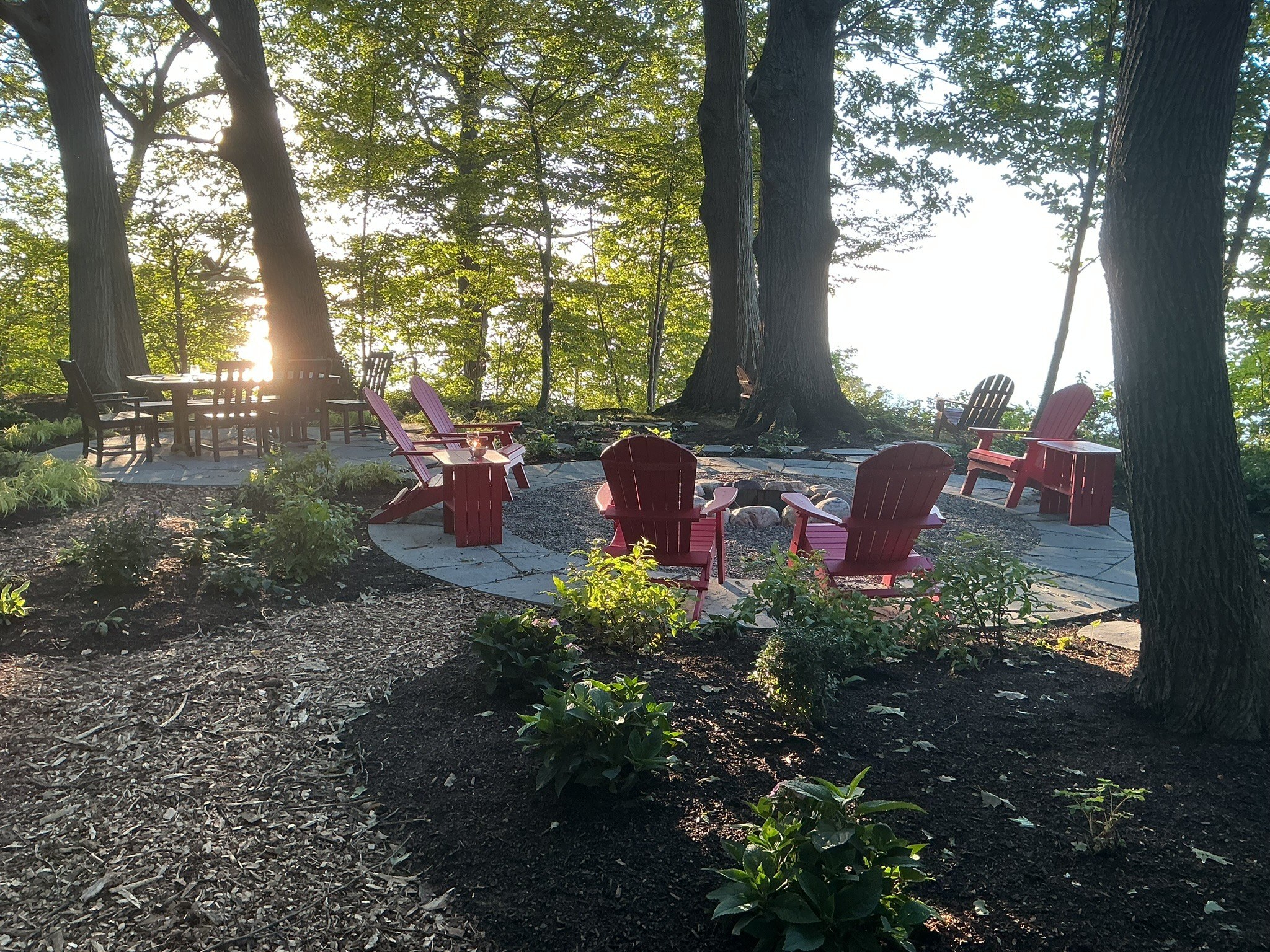 Natural stone patio and fire pit at Woodlands Retreat on the Lake