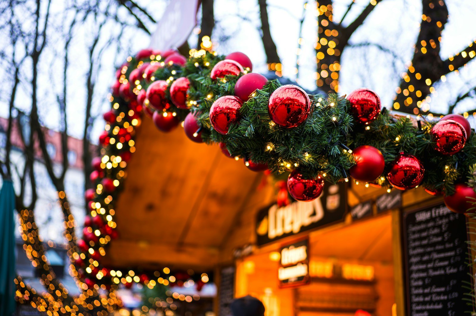 Christmas decorations and garlands on a market stall in Munich