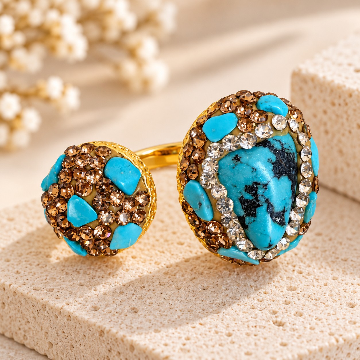 Gold-tone rings with polished stone details