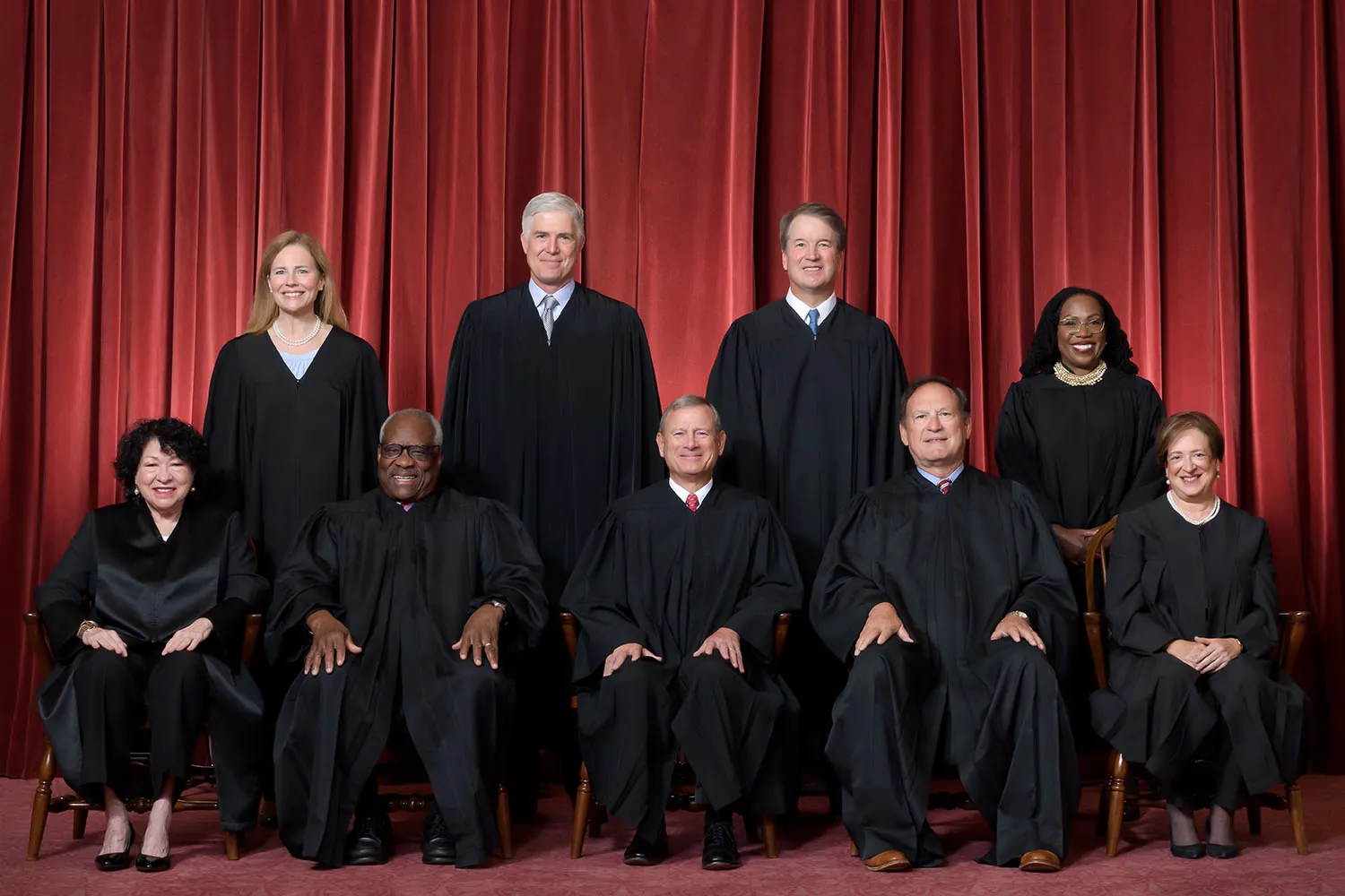 Nine United States Supreme Court justices in formal robes