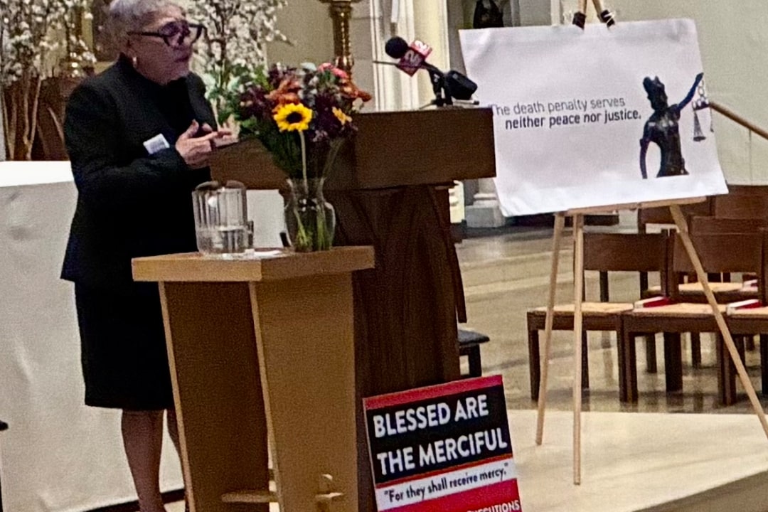 Reverend Sharon Risher speaking at St. Joseph University Parish Church in Buffalo.