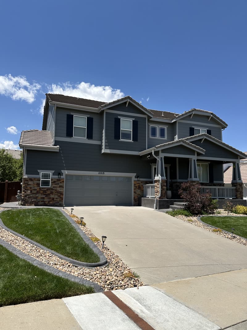 Finished dark blue exterior with white trim