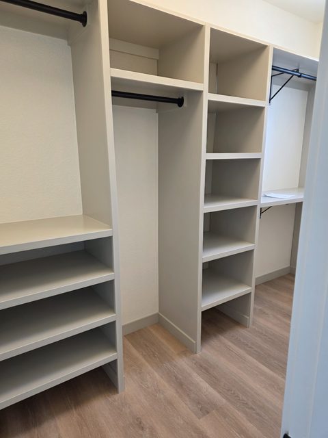 Custom white built-in shelving and cabinetry