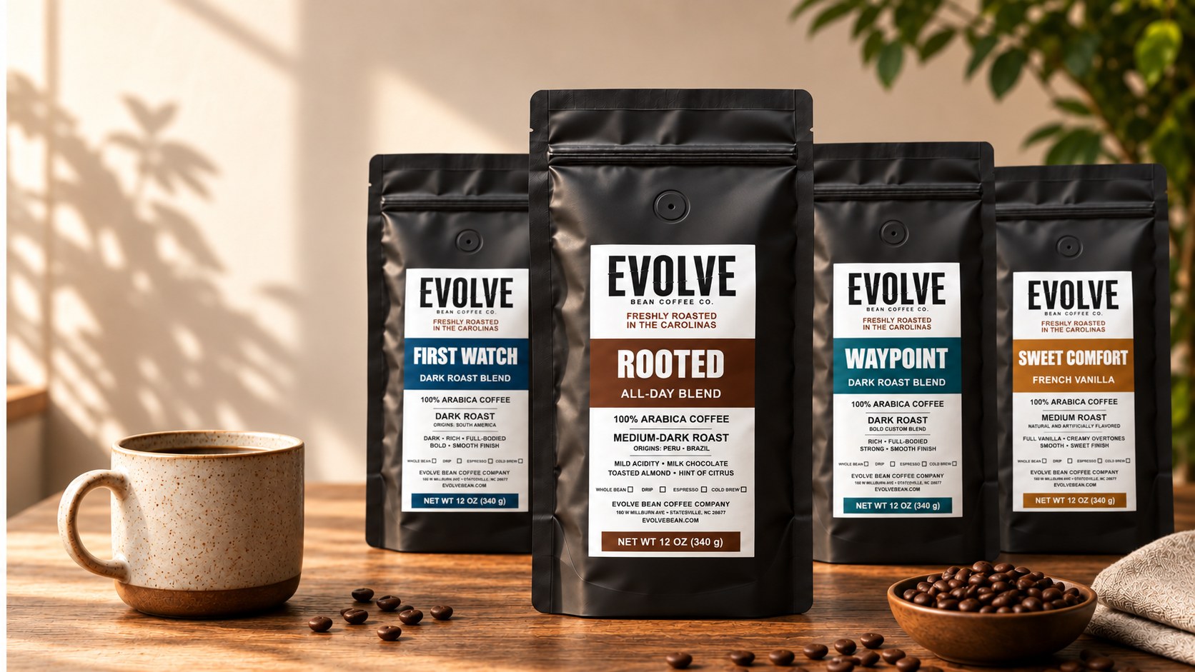 Evolve Bean coffee bags beside a cup of coffee