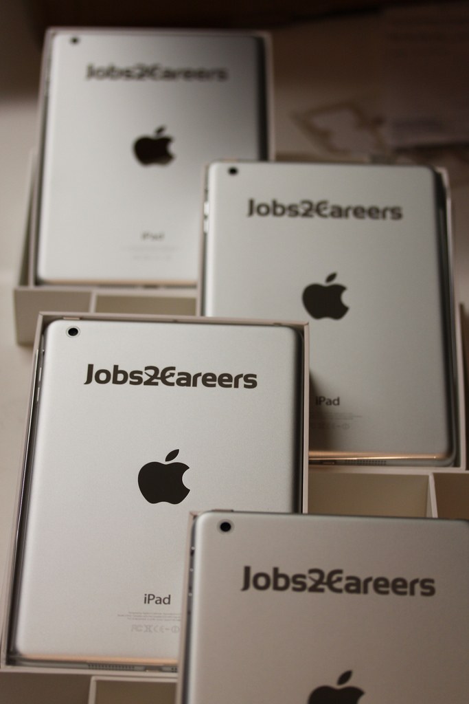 A group of branded iPad minis returned to their original boxes