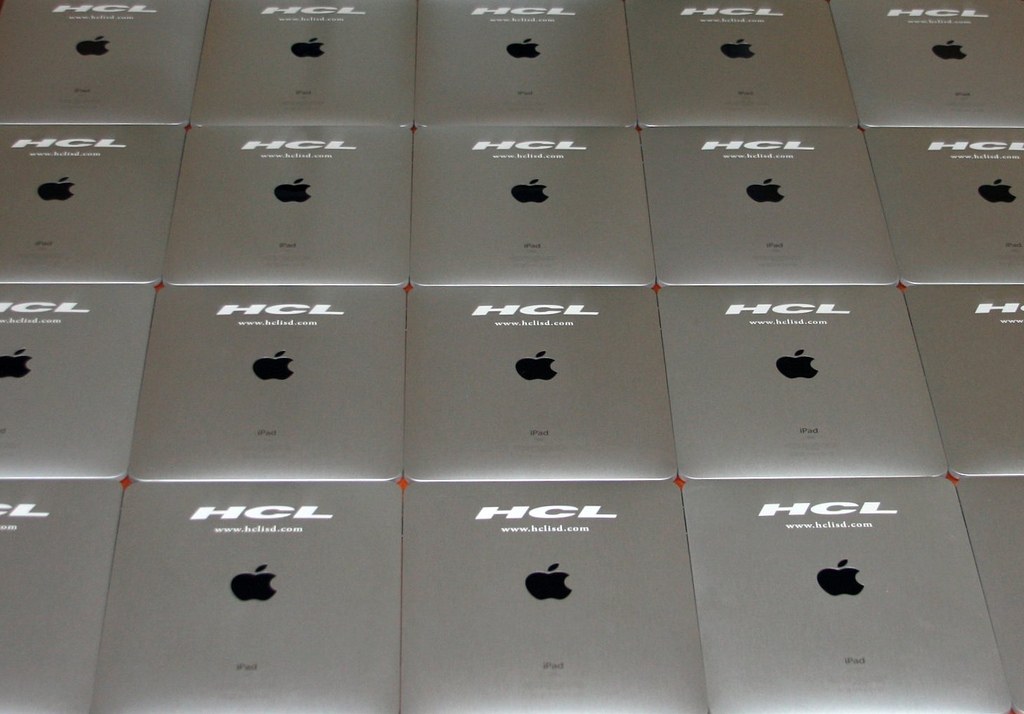A batch of corporately marked iPads arranged for a production run