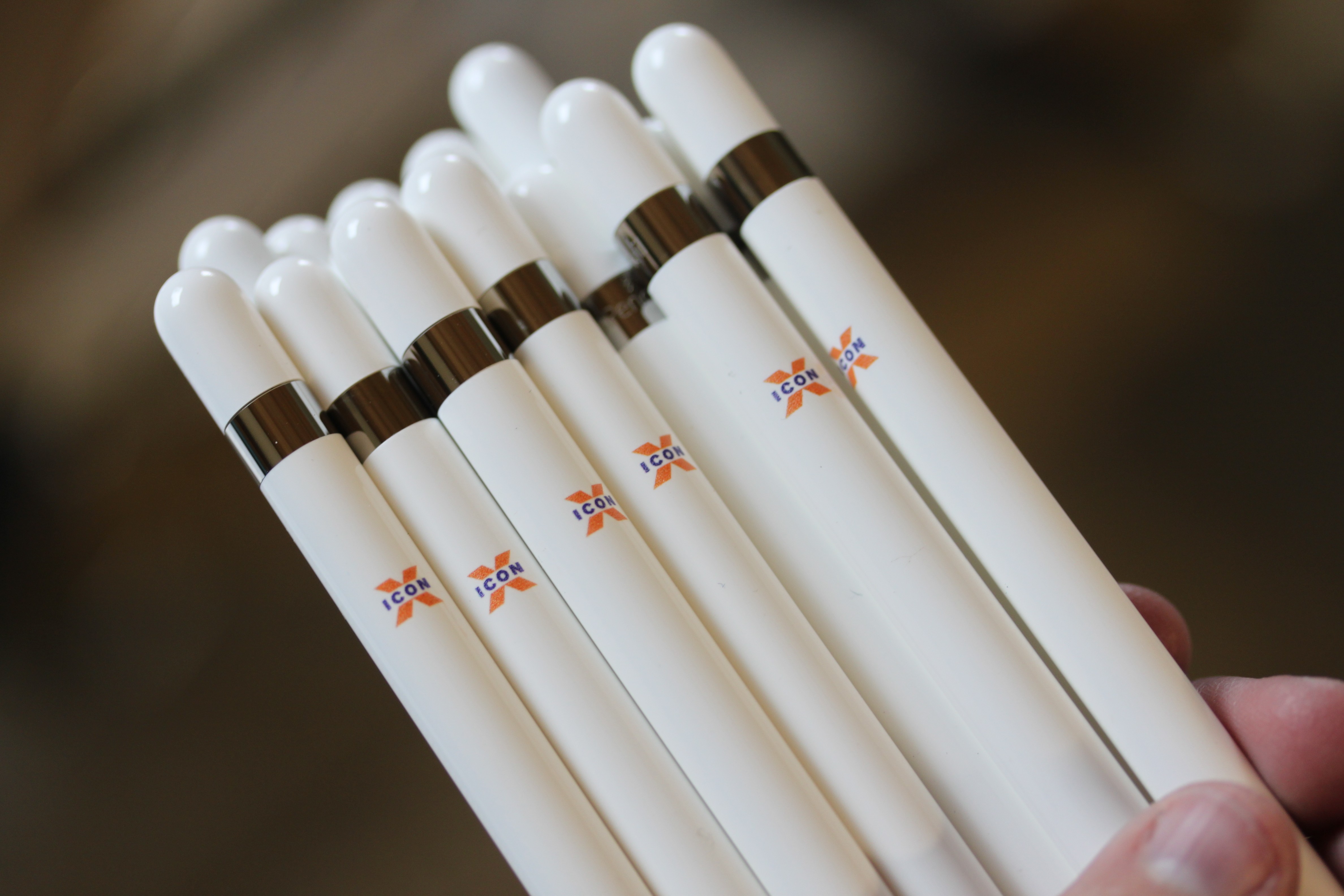 A coordinated set of branded Apple Pencils with precise marks