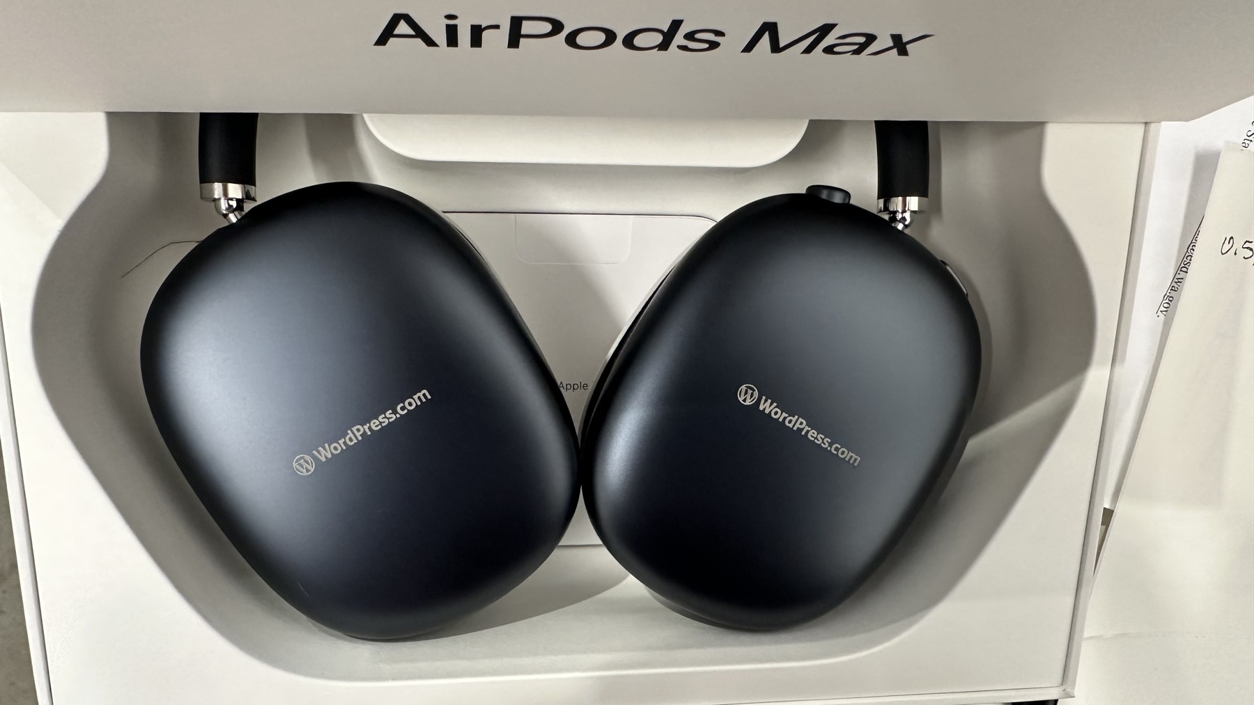 WordPress.com logos engraved on AirPods Max ear cups