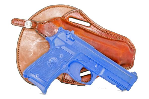 Holster for Bretta 9 mm, all leather comes in medium and light brown, black and natural
