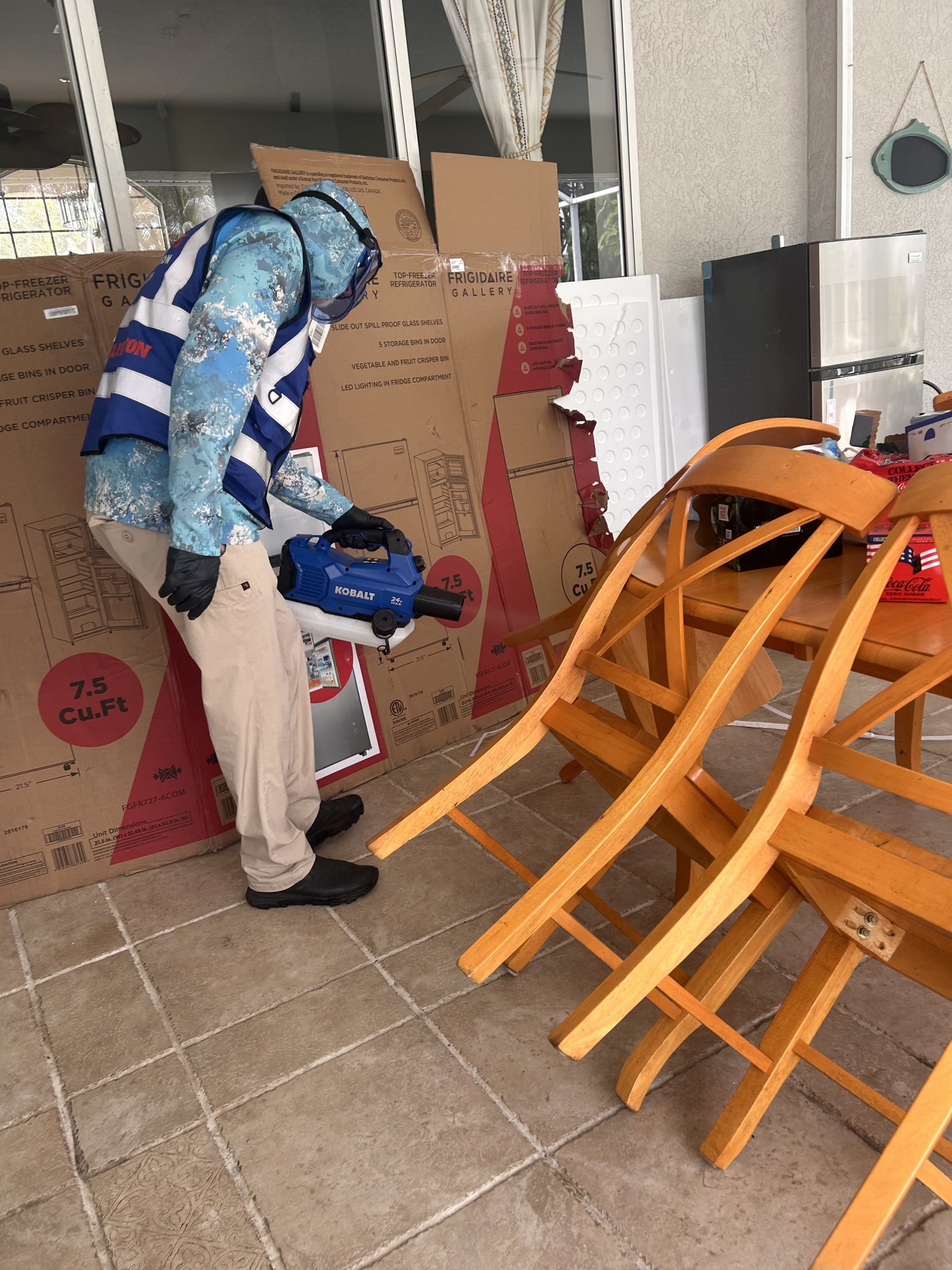 Peyton’s Pest Prevention technician providing a careful interior treatment