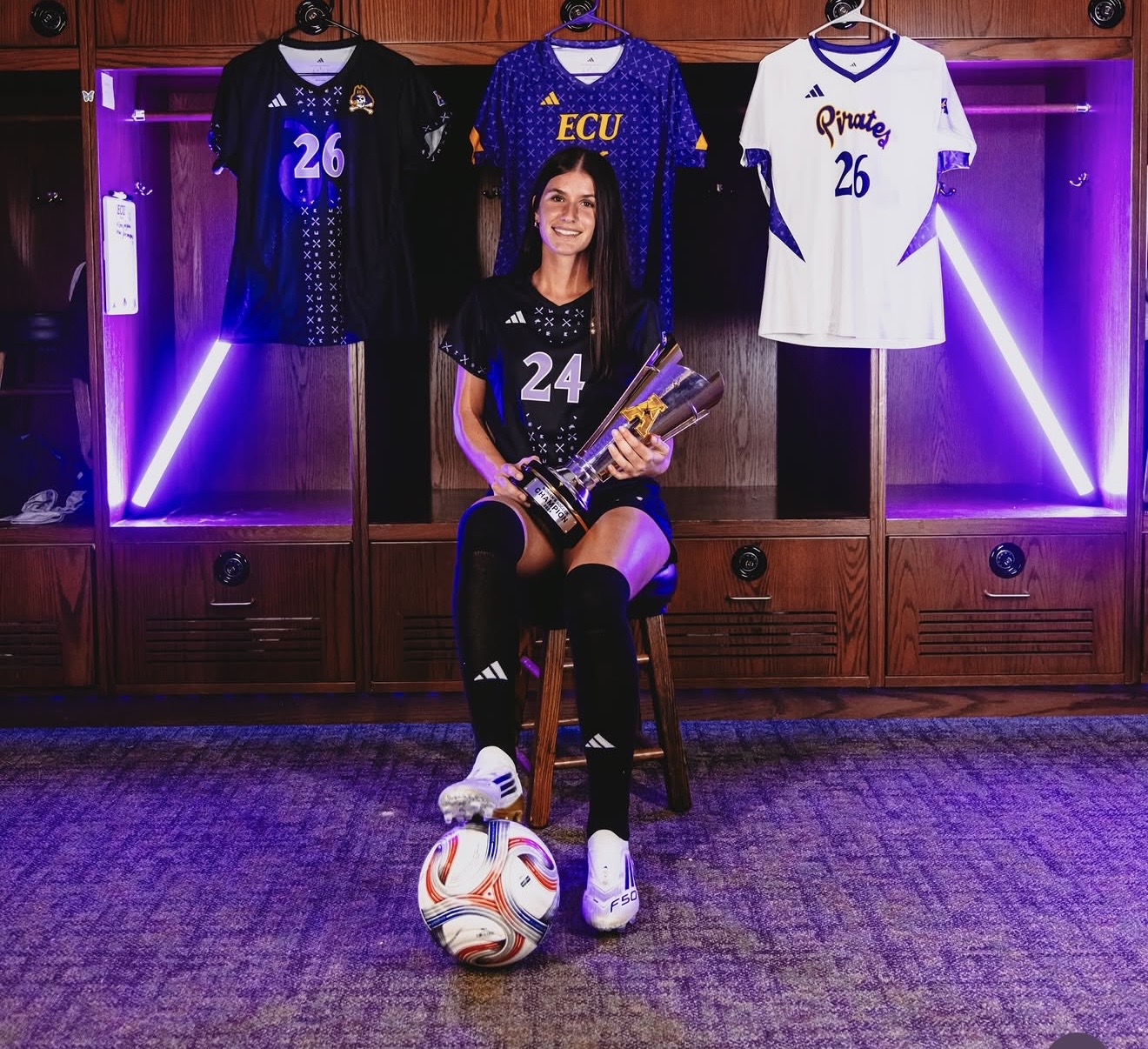 Regan Tokarz celebrating her commitment to East Carolina University