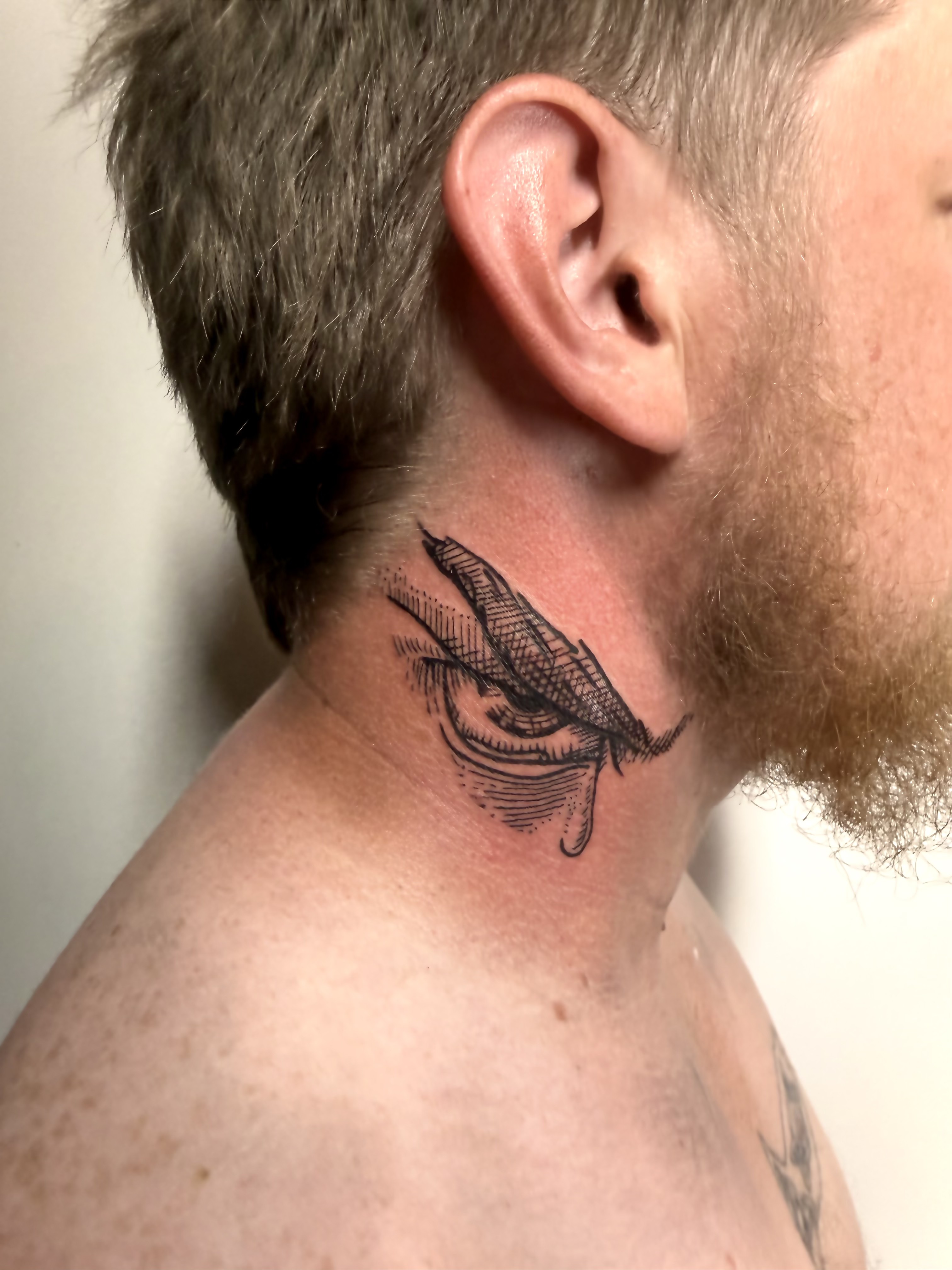 Fine line swallow tattoo on a client's arm