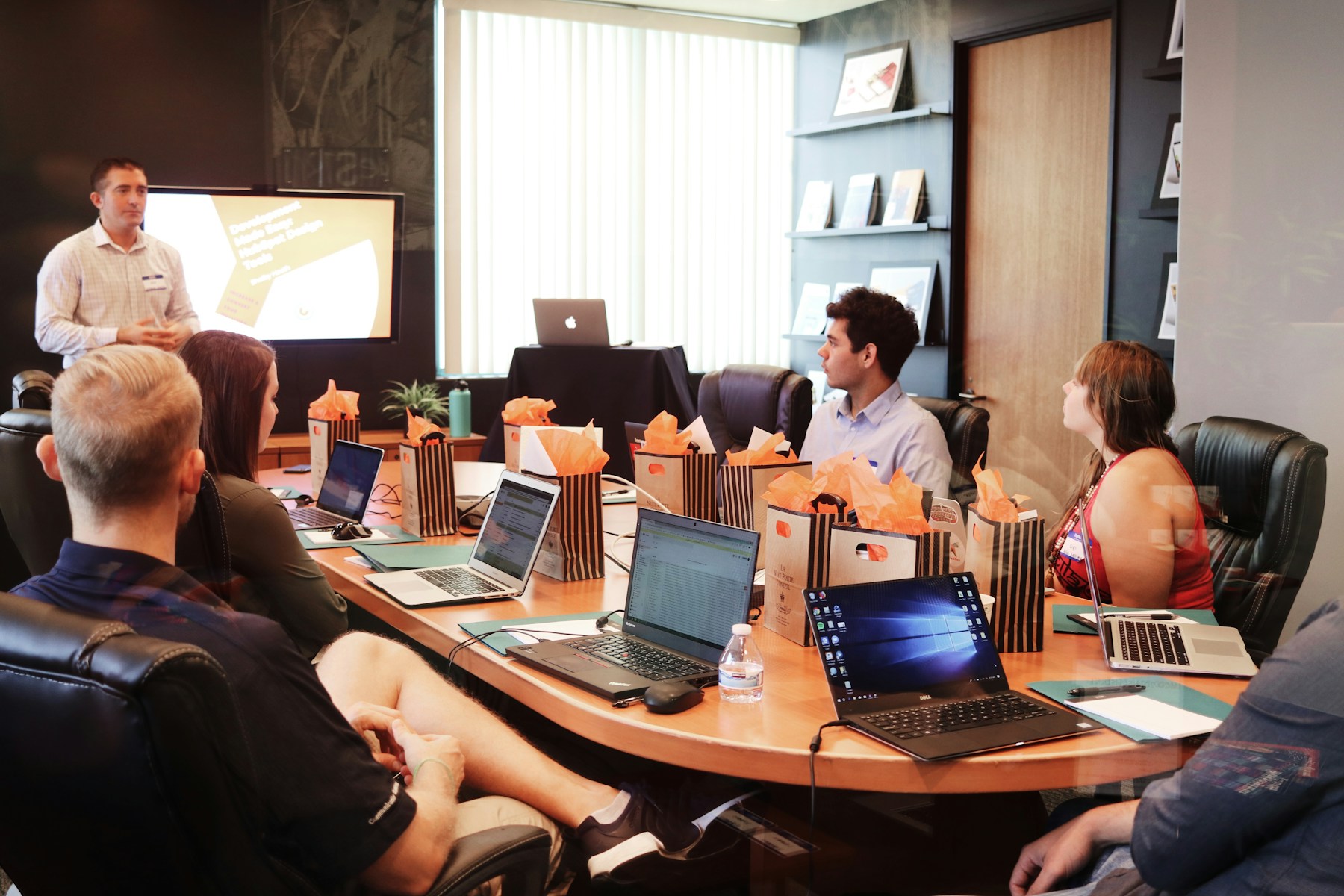 Team reviewing work around a conference table