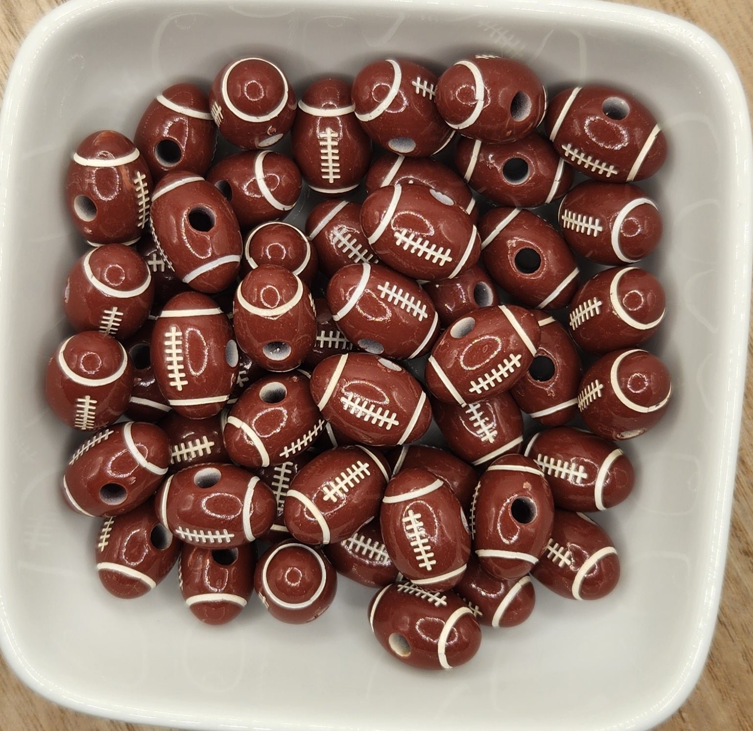 12 mm by 18 mm Acrylic Football beads. (*Individually sold* price for one bead), photo 2