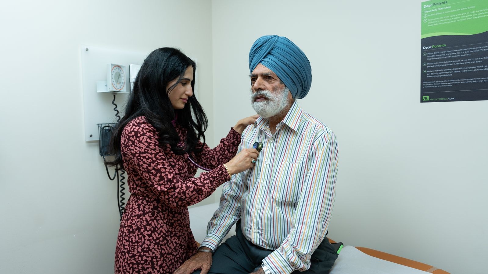 Doctor examining a senior man with a stethoscope