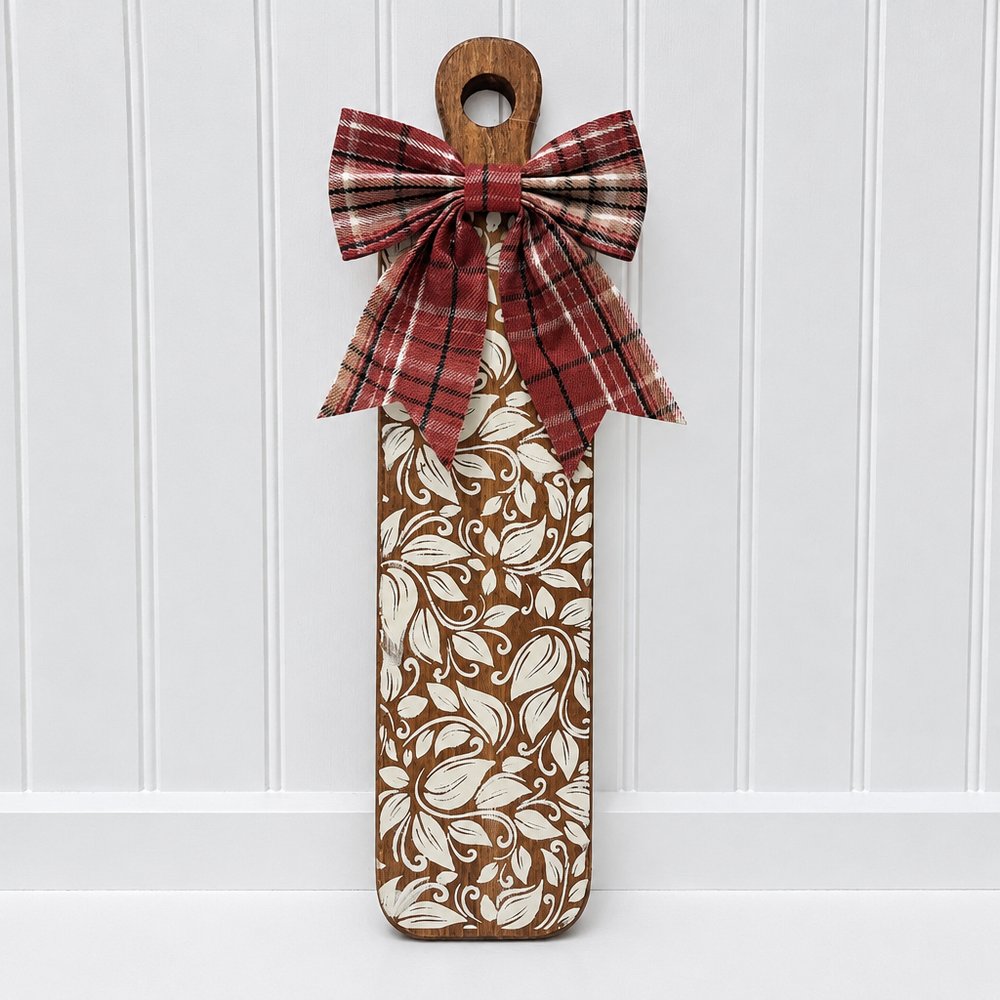 Floral decorative board with a red plaid bow