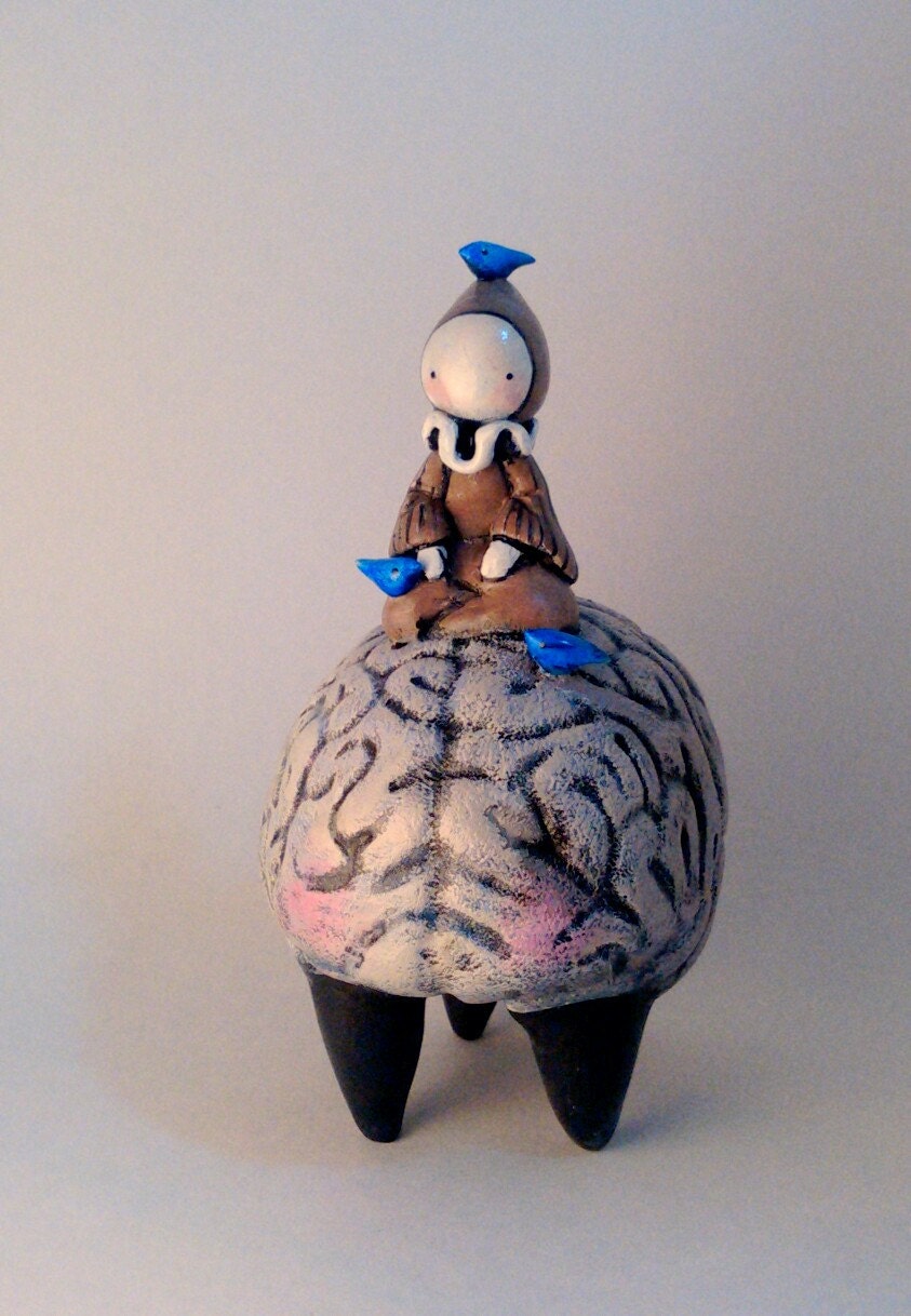 A handmade Poppet sculpture by Lisa Snellings