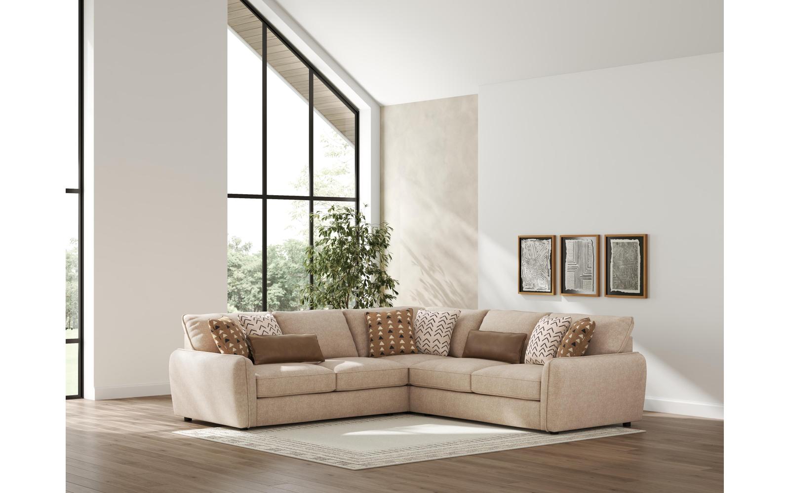 Ashley Seyler sectional in a bright living room.