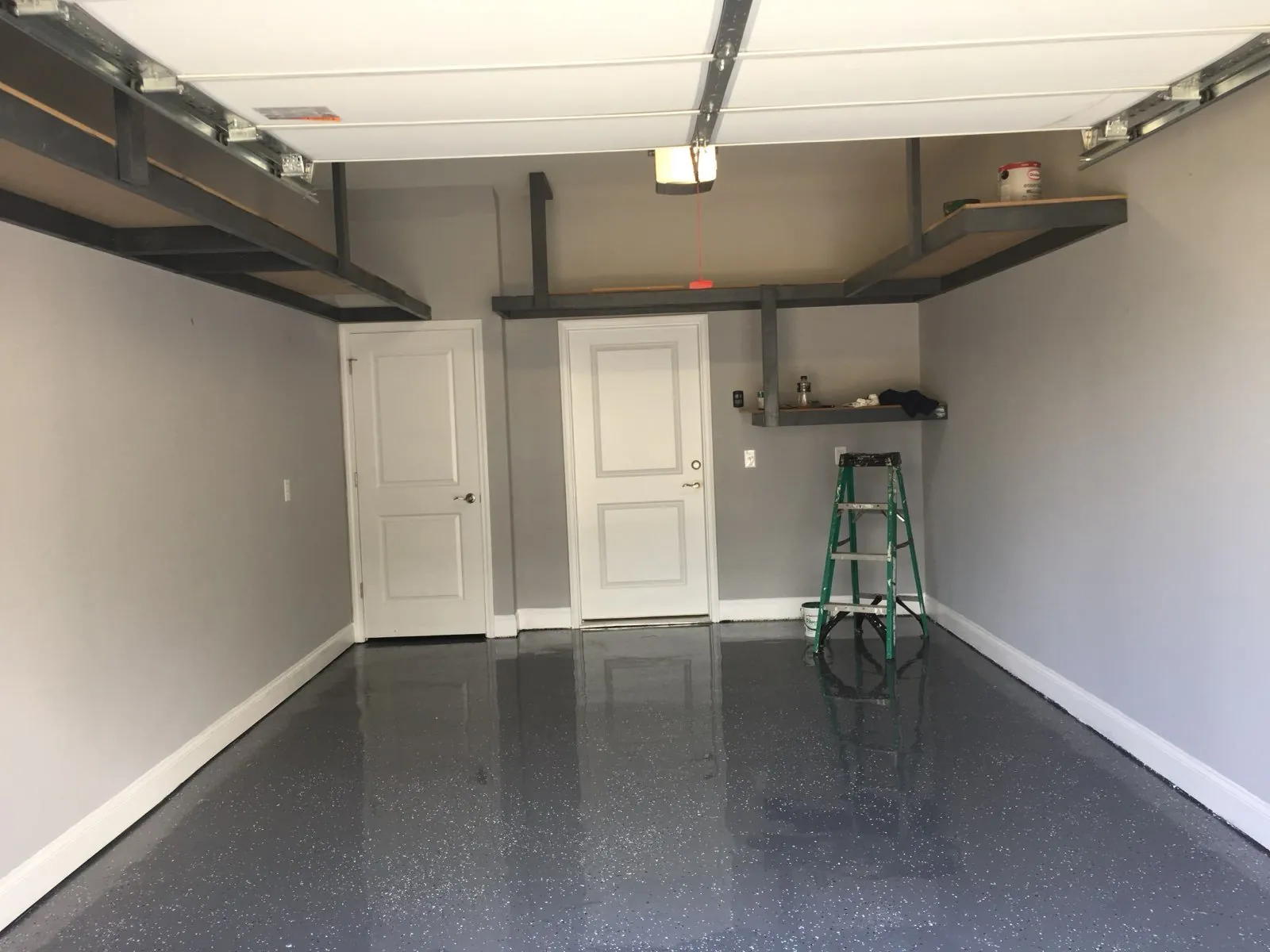 Garage transformed with shelving and new floor