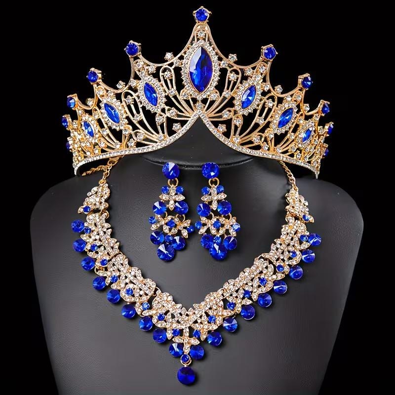 A Glorious Cathedral Style ensemble consisting of a Sparkling Tiara, Necklace, & Earrings. A Royal Halloween accessory.