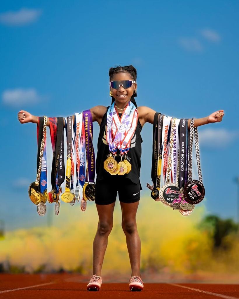 Virginia Pride athlete competing on the track