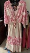 Customer photo of the pink and white Boho Bloom Maxi Dress on a hanger