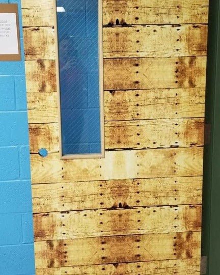 Teacher door wrap with a colorful classroom design
