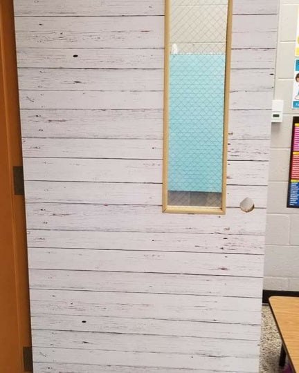 Decorated school door wrap with a colorful theme