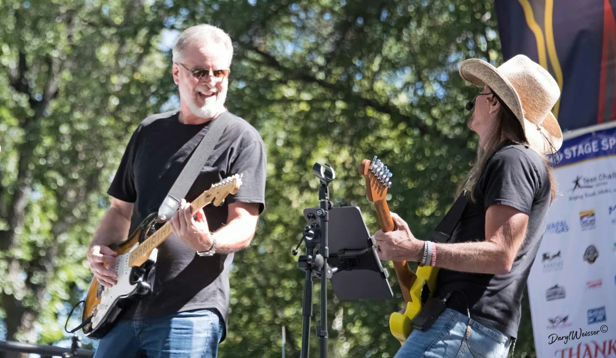 Ron and Brandon playing guitar together during worship