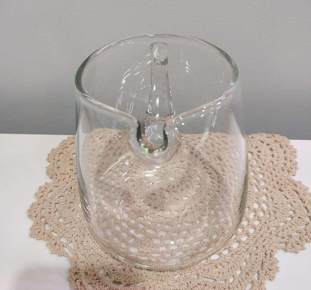 Hand Blown Glass Pitcher: Minimalist Borosilicate Jug with Ice Lip, view 8