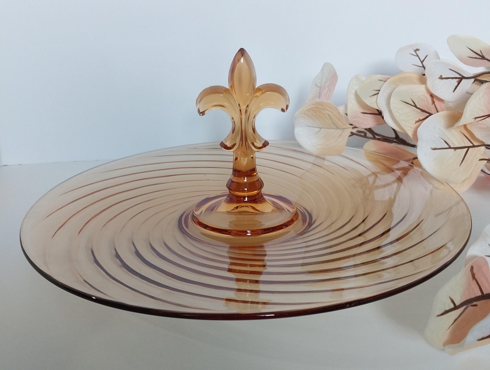 1930s French Amber Swirl Glass Serving Plate: Fleur-de-Lis Art Deco Centerpiece