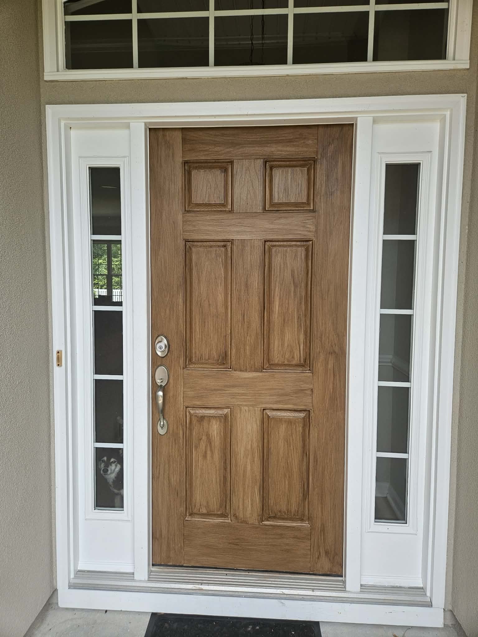 Front entry after faux wood finishing
