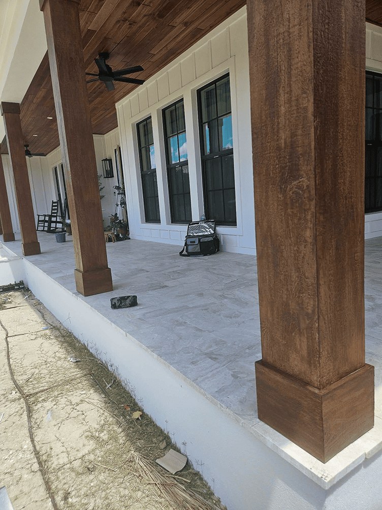 Porch column after faux wood finishing