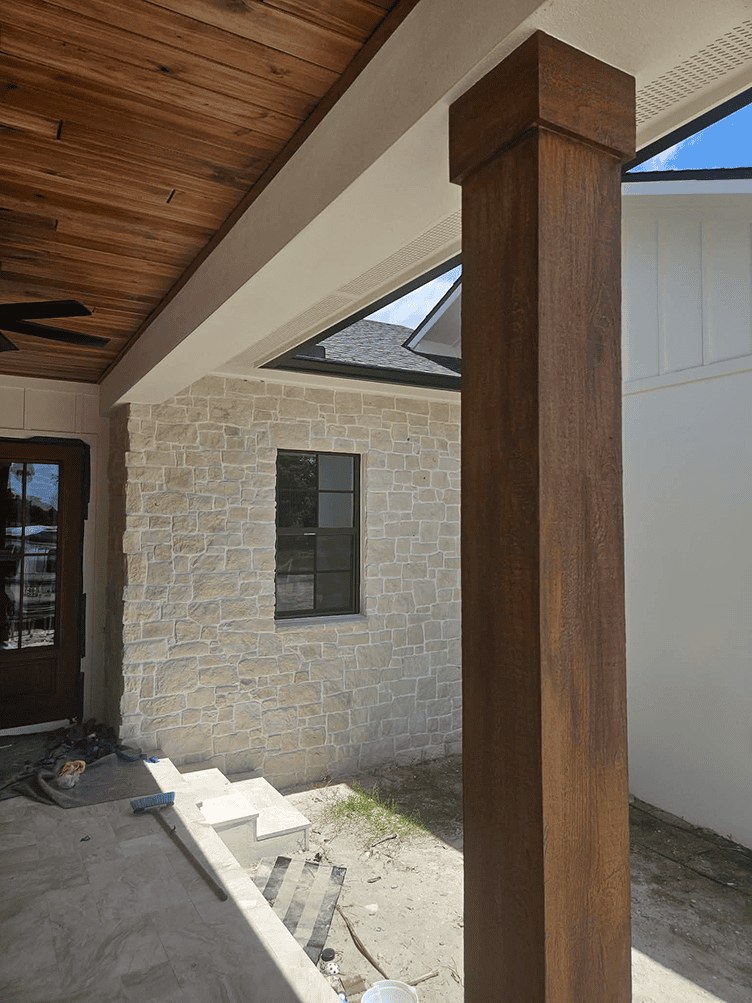 Porch column after faux wood finishing