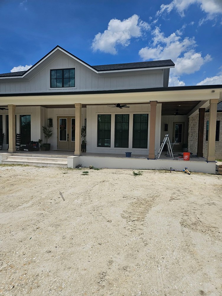 Farmhouse porch before faux wood finishing