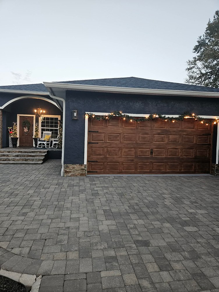 Garage door after faux wood finishing
