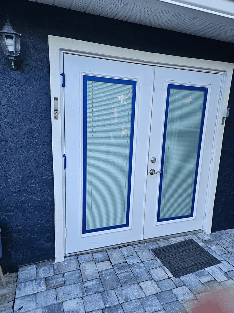 French doors before faux wood finishing