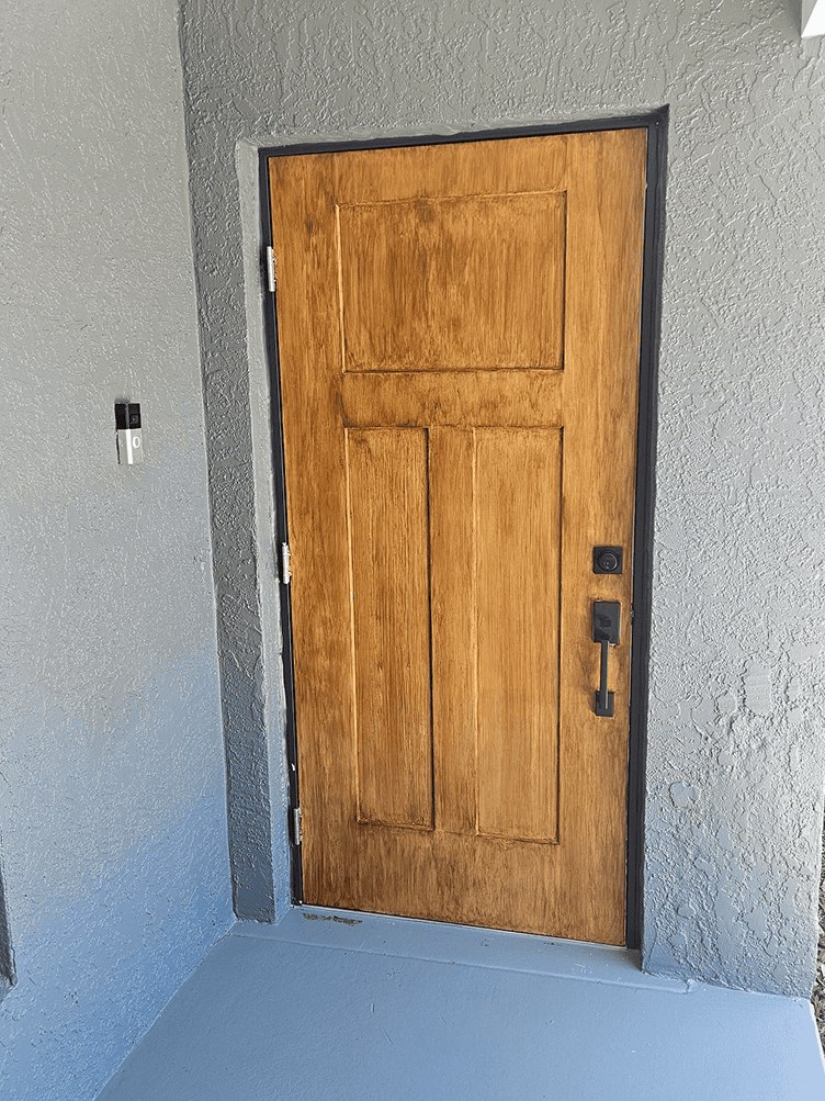 Entry door after faux wood finishing