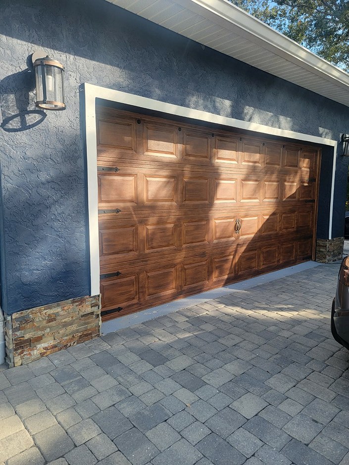Garage door before faux wood finishing