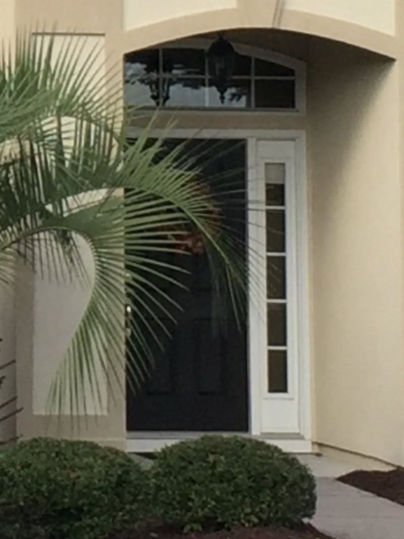 Front entry before faux wood finishing