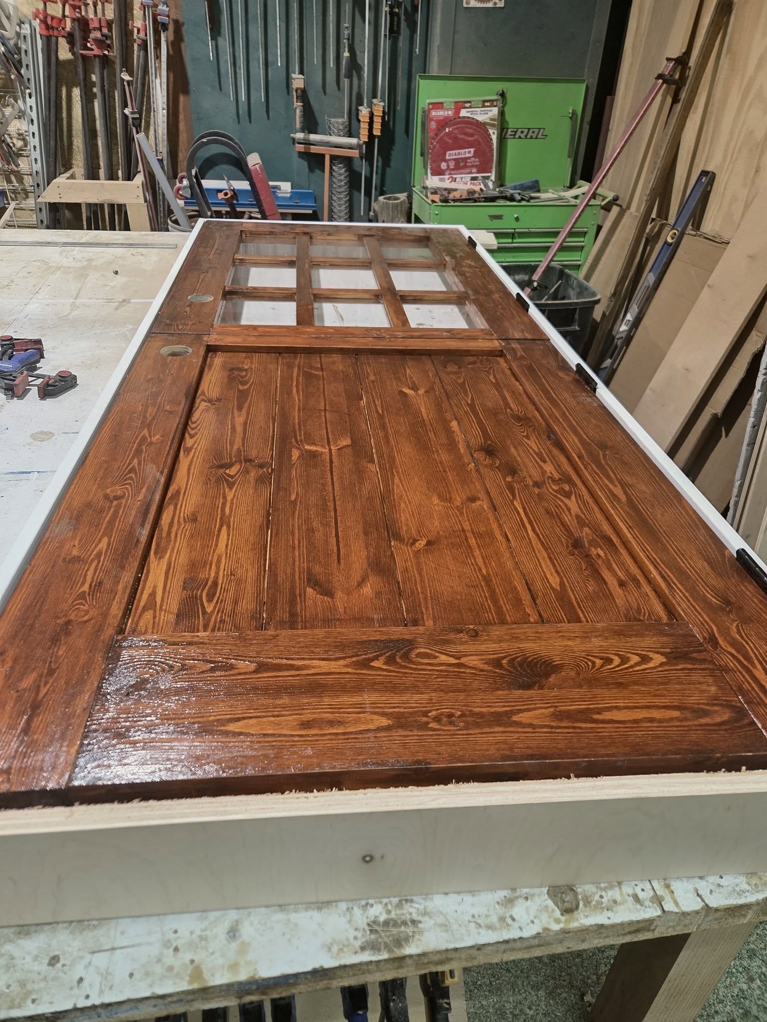 Custom table with a sliding barn-style door