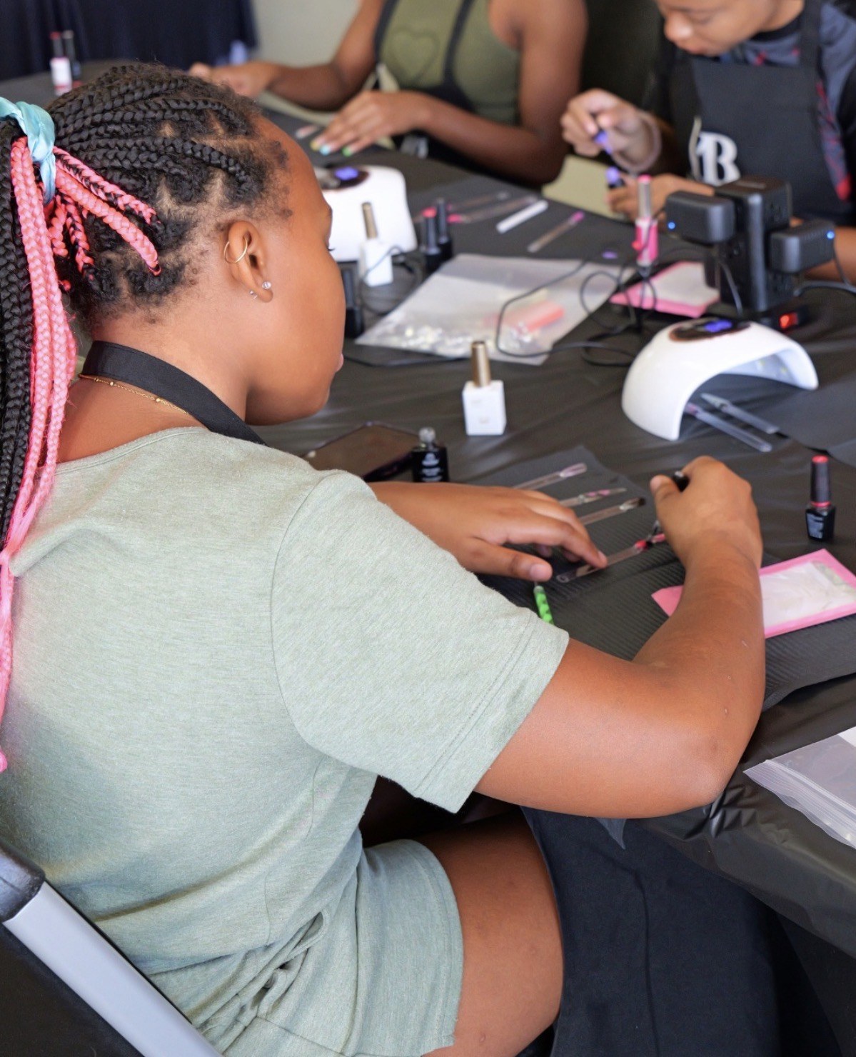 Youth Braid and Business Academy students participating in a classroom activity