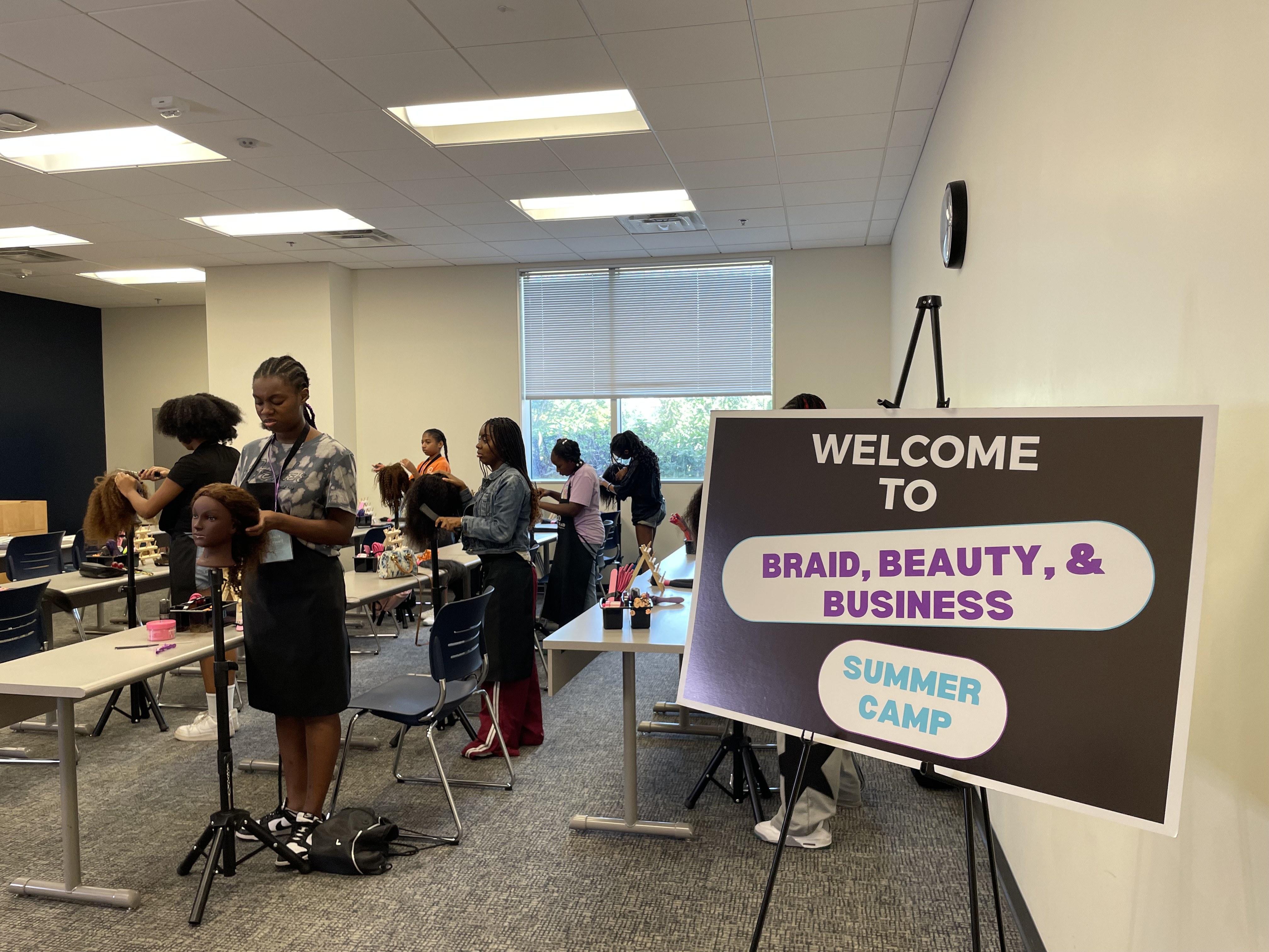 Youth Braid and Business Academy instructor leading a classroom session