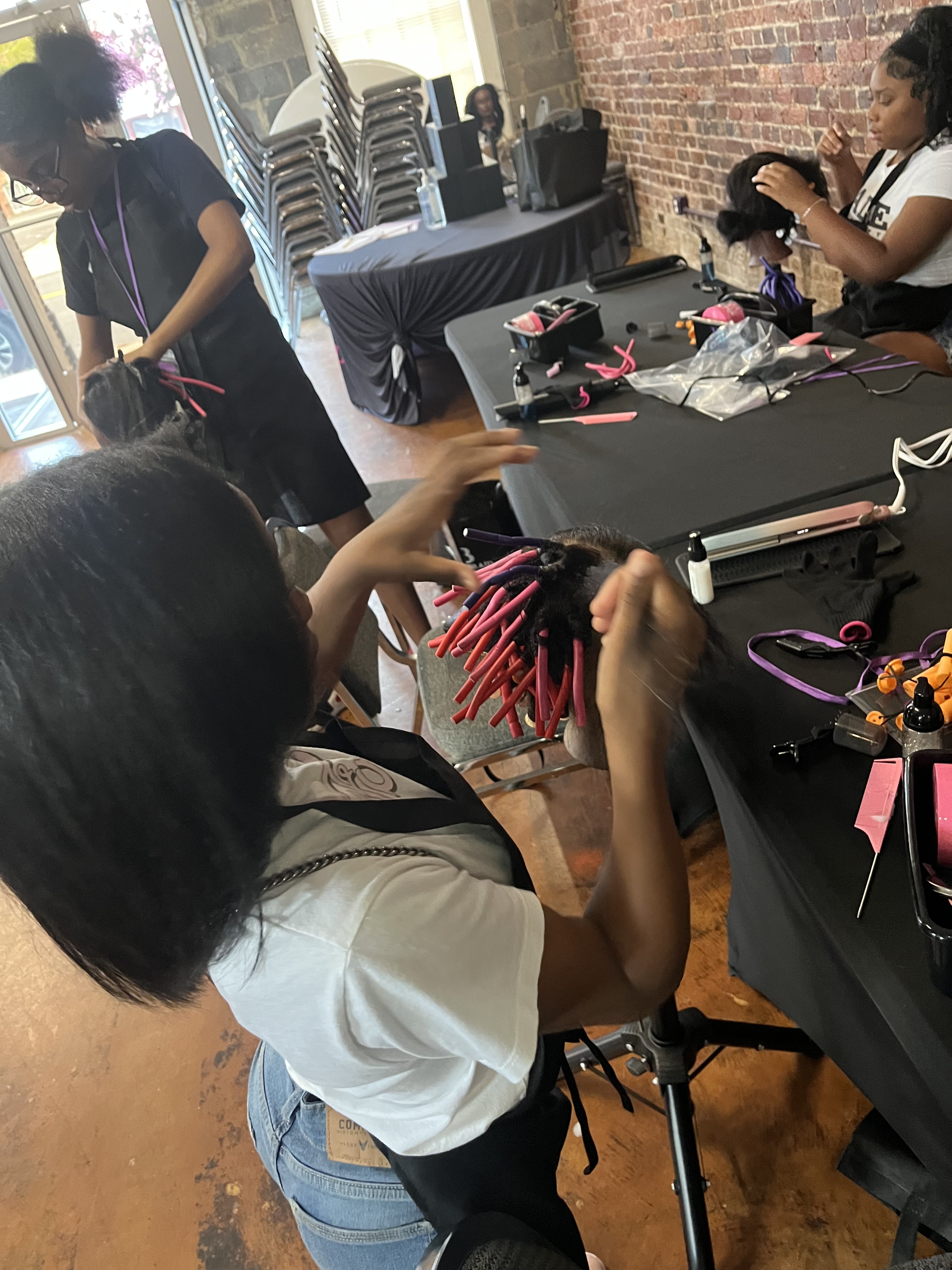 Students learning beauty and business skills